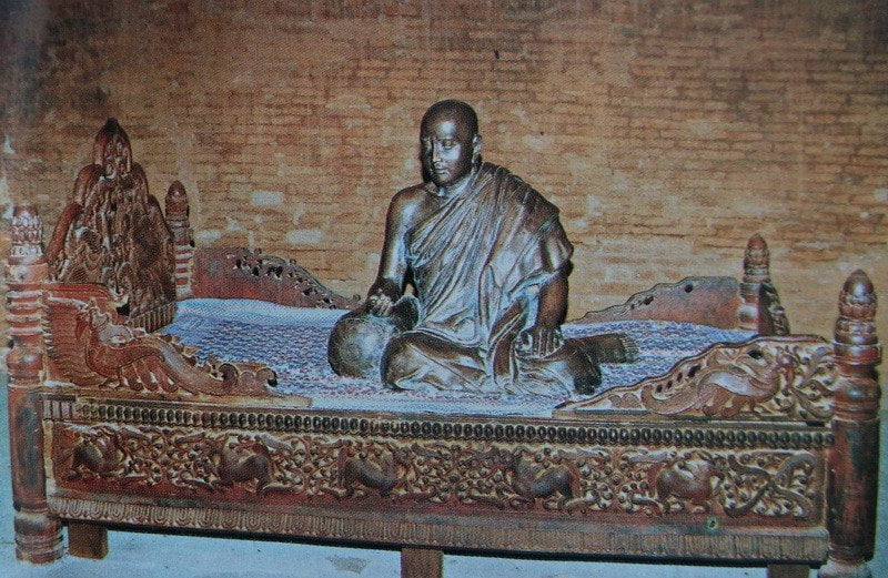 Image of Shin Arahan Seated on Carved Couch