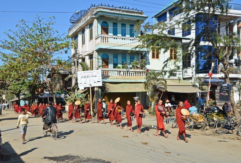 Monks on their morning alms collecting