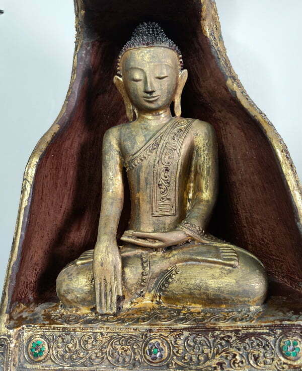 Buddha Statue seated under Naga